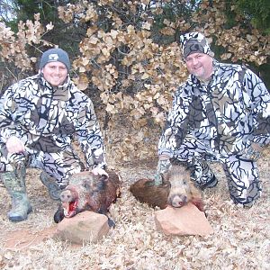 Chad and Scott with their hogs
